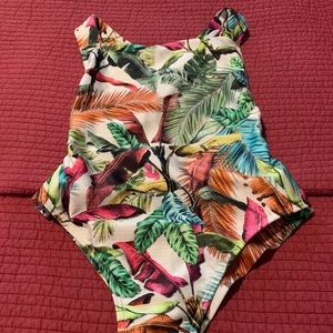 Elegance Brazilian swimsuit! Print has vibrant colors! Crisscross back.